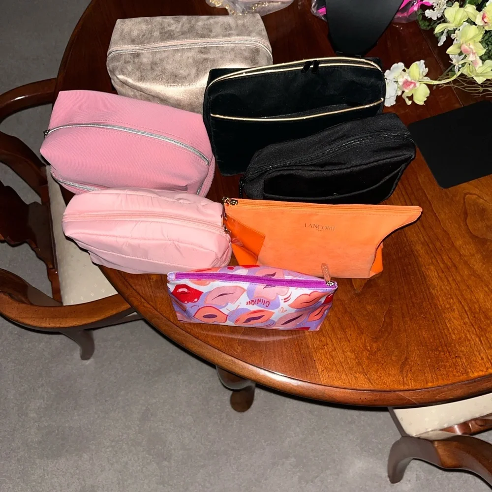 Various Cosmetic Pouches with product -details in live show